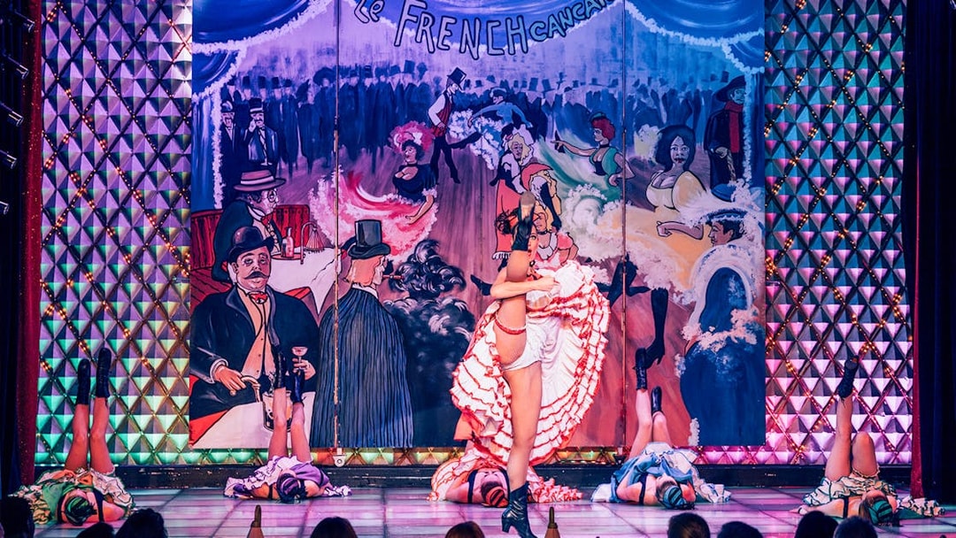 Cabaret La Nouvelle Eve dancers performing French cancan in Paris.