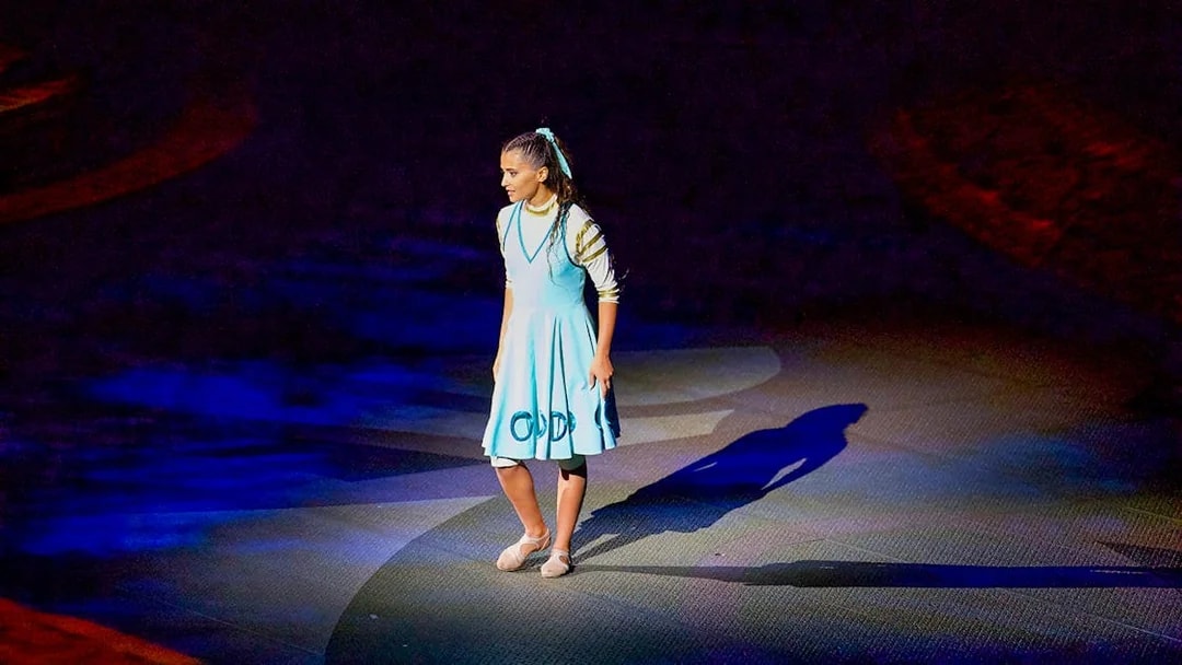 Performer on stage at La Perle by Dragone show in Dubai.