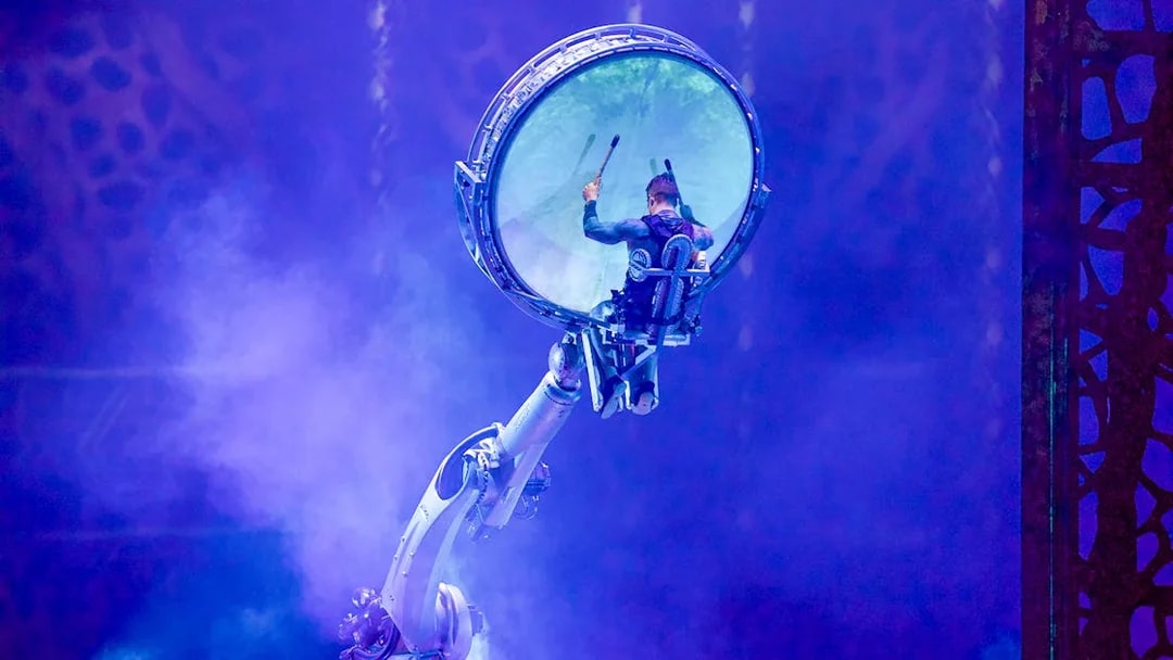Performer in mechanical arm at La Perle by Dragone show in Dubai.