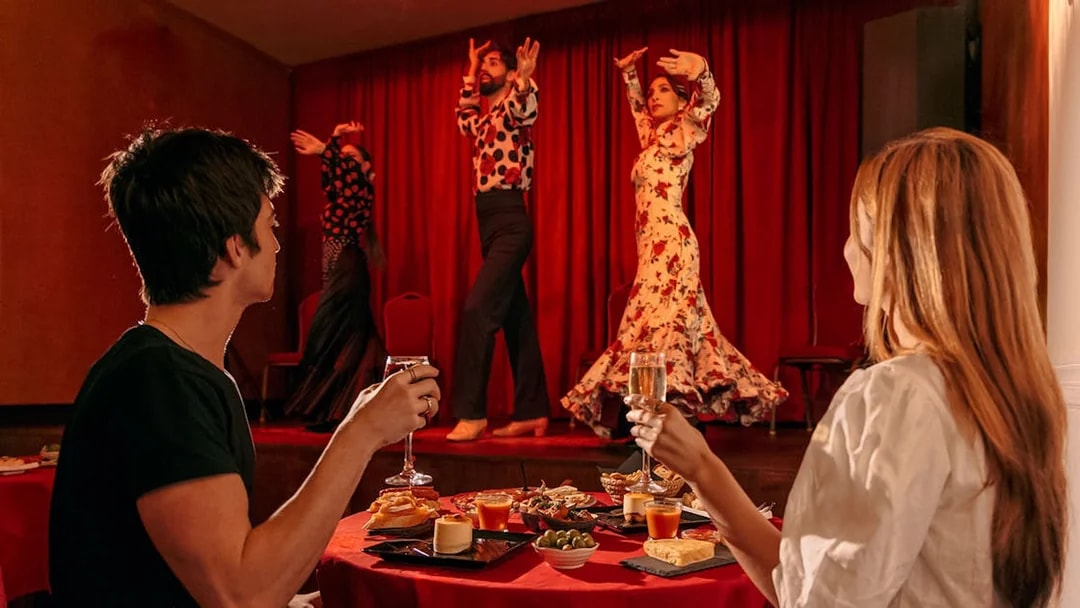 Flamenco dancers performing on stage at Laietana, Barcelona, with audience dining.
