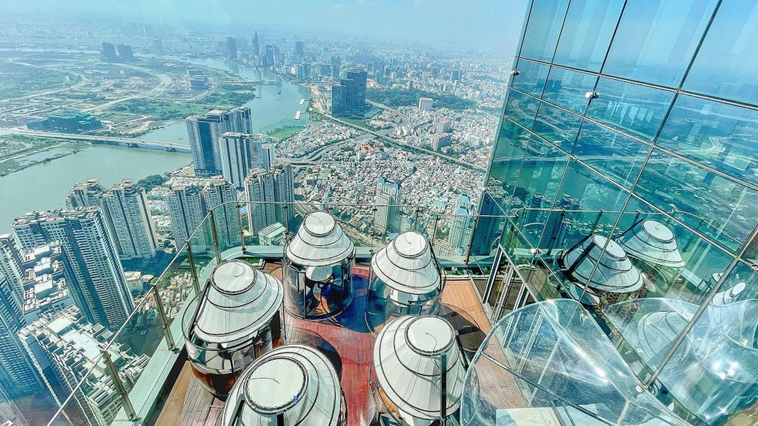 Skyview from Landmark 81 in Saigon overlooking cityscape and river.