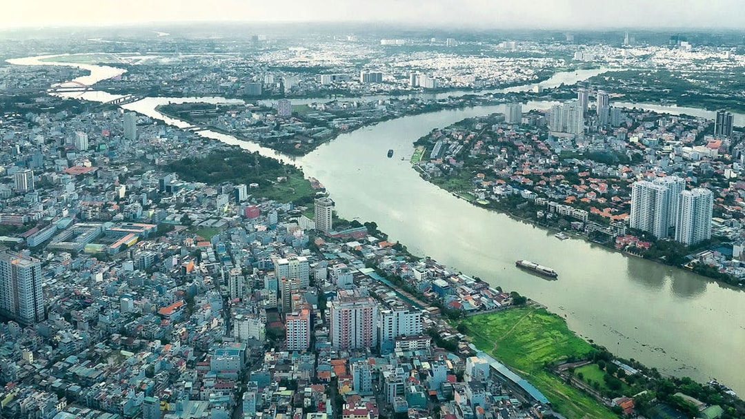 Aerial view of Saigon cityscape and river from Landmark 81 Skyview.