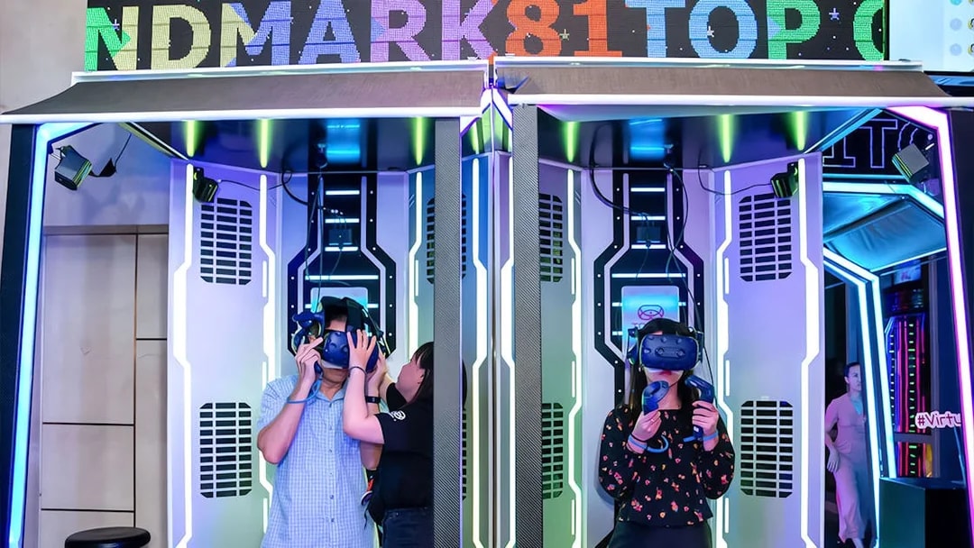 Virtual reality experience at Landmark 81 with visitors using VR headsets.