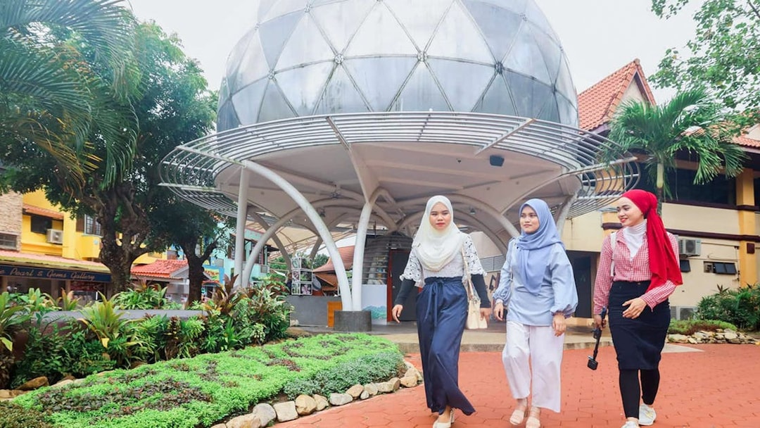 Women walking near SkyDome in Langkawi, Malaysia.