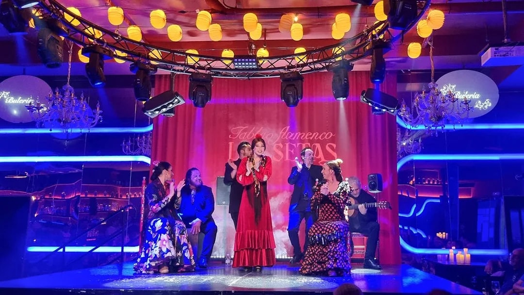 Flamenco dancers performing at Las Setas in Seville, Spain.