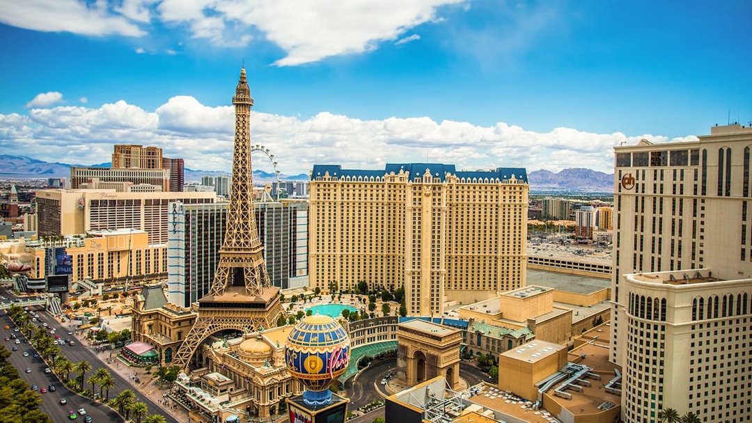 Las Vegas Strip with Eiffel Tower replica and surrounding hotels.