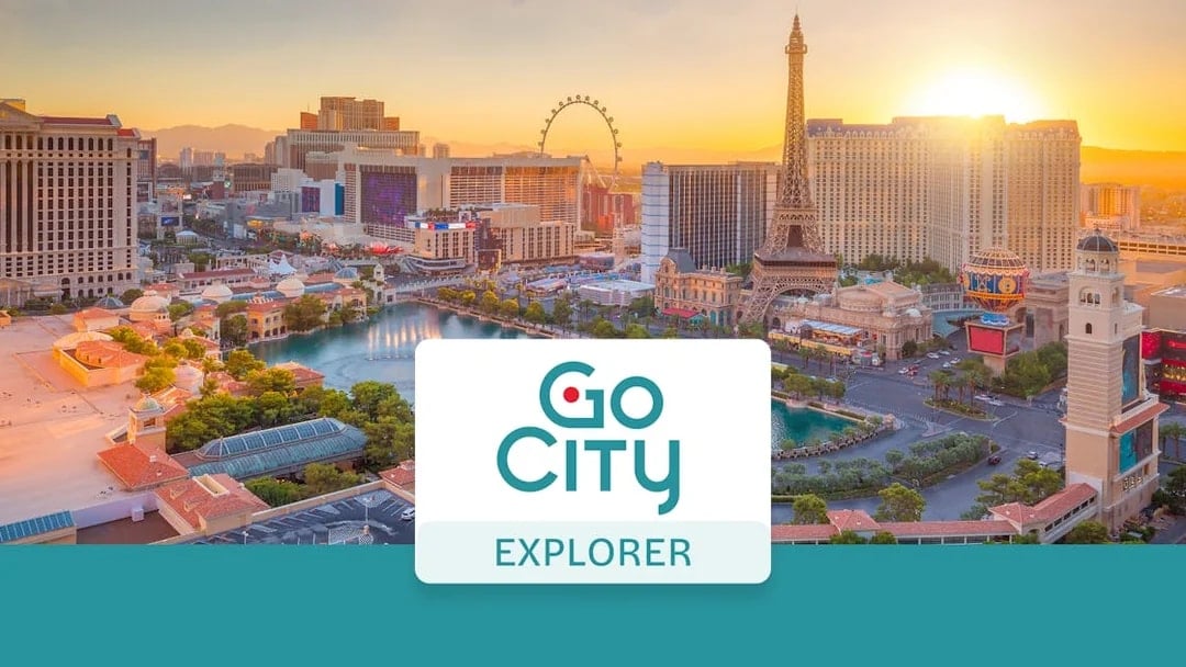 Las Vegas skyline with Eiffel Tower replica and Go City Explorer logo.