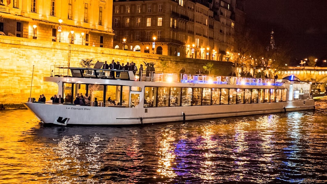 Diamant Bleu dinner cruise on Seine River at night, Paris.