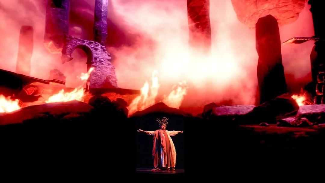 Performers on stage with fiery backdrop at Legends of Istanbul show.