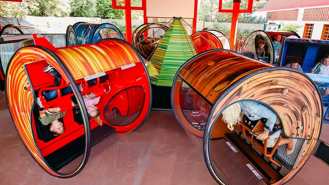 Guests enjoying spinning rides at LEGOLAND Deutschland.