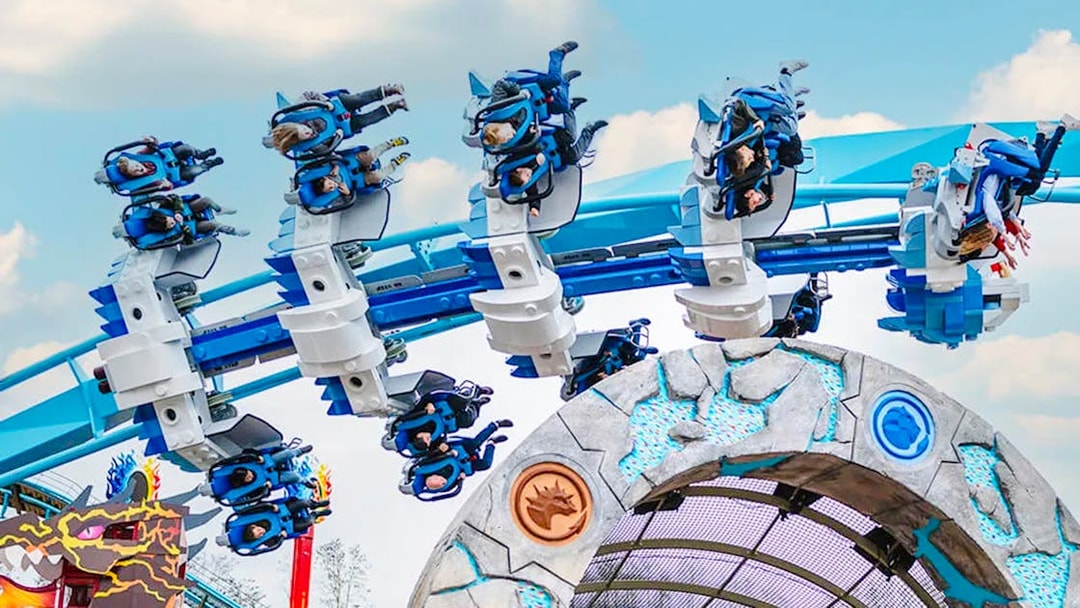 Guests on a roller coaster at LEGOLAND Deutschland.