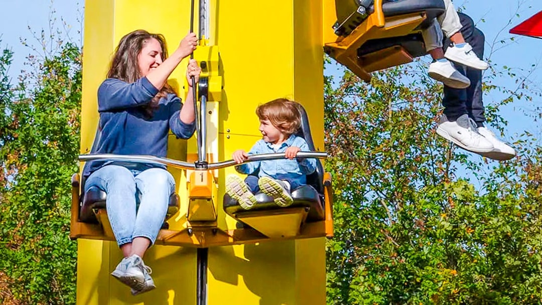 Guests on a ride at LEGOLAND Deutschland, enjoying the experience.