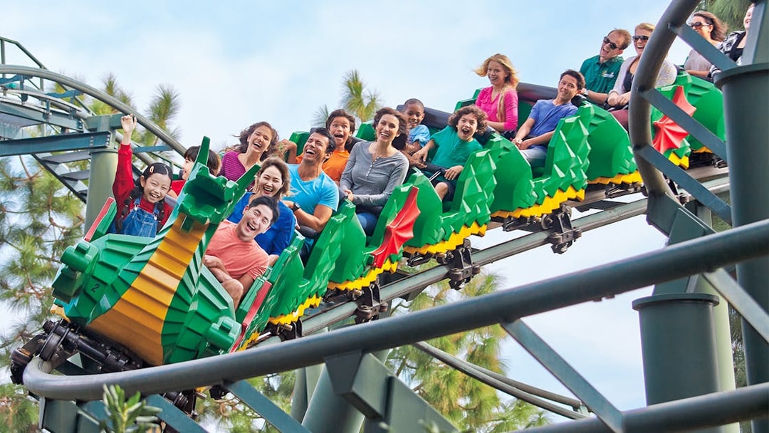 Roller coaster ride at Legoland Korea with excited visitors.