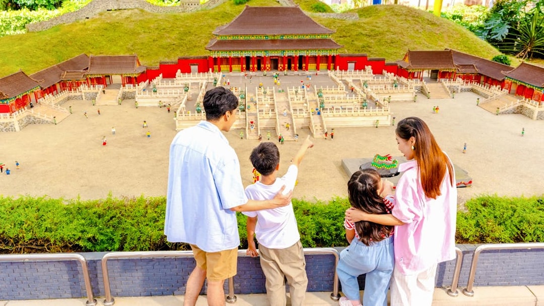 Family viewing LEGO Forbidden City model at LEGOLAND Malaysia Theme Park.