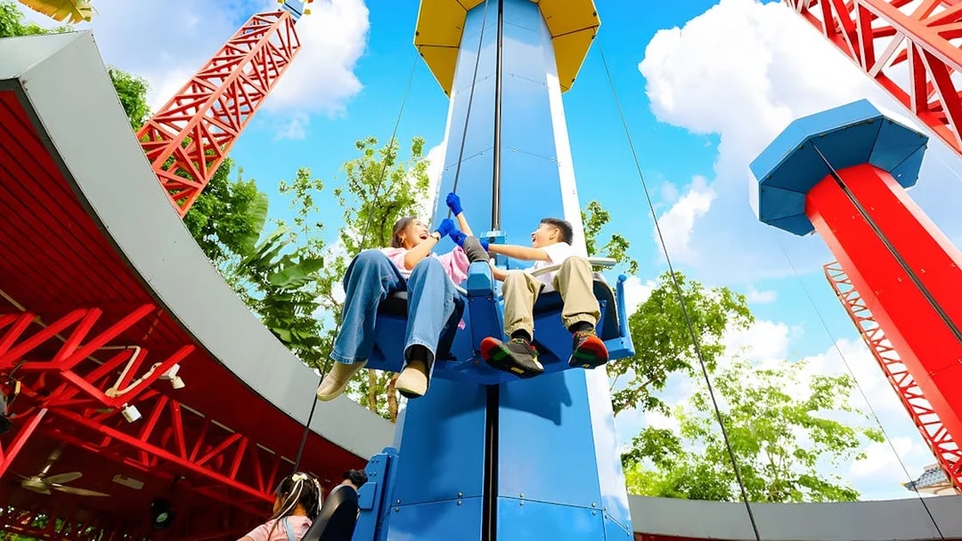 Mother and son enjoying a ride at LEGOLAND Malaysia Theme Park.