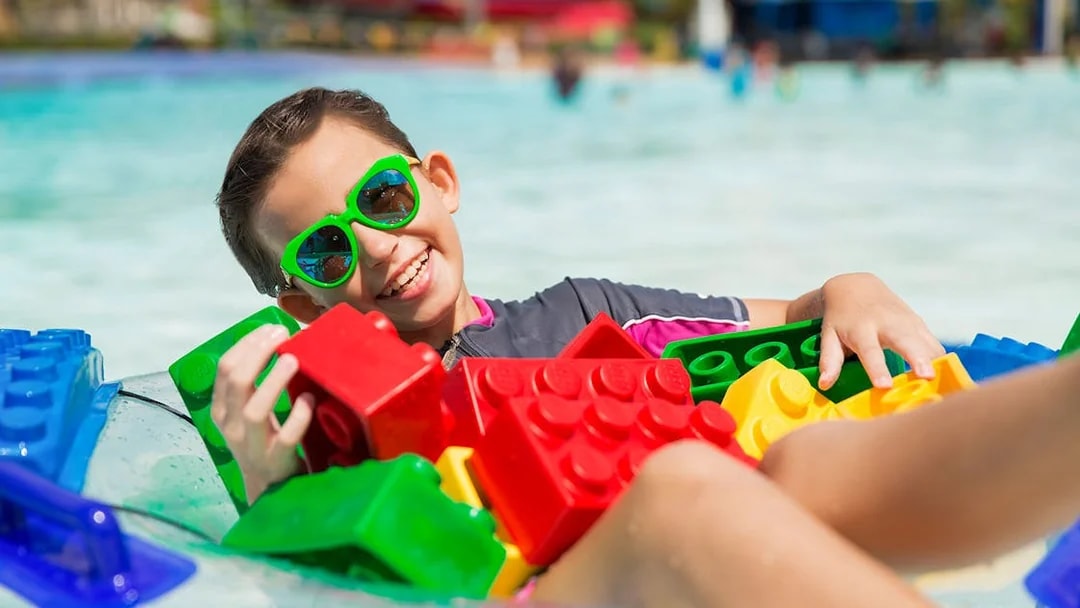 Boy enjoying wave pool with LEGO bricks at LEGOLAND Malaysia Waterpark.