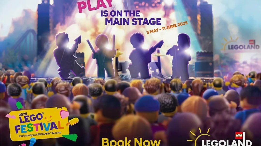 LEGO figures performing on stage at LEGOLAND Windsor Resort festival event.