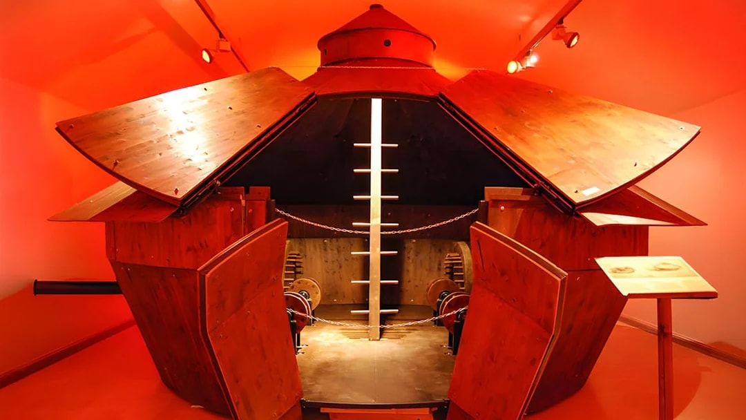Leonardo da Vinci museum exhibit featuring a wooden armored vehicle model.