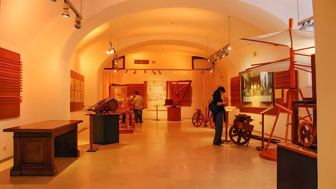 Exhibit of Leonardo da Vinci's inventions at the museum, featuring models and sketches.