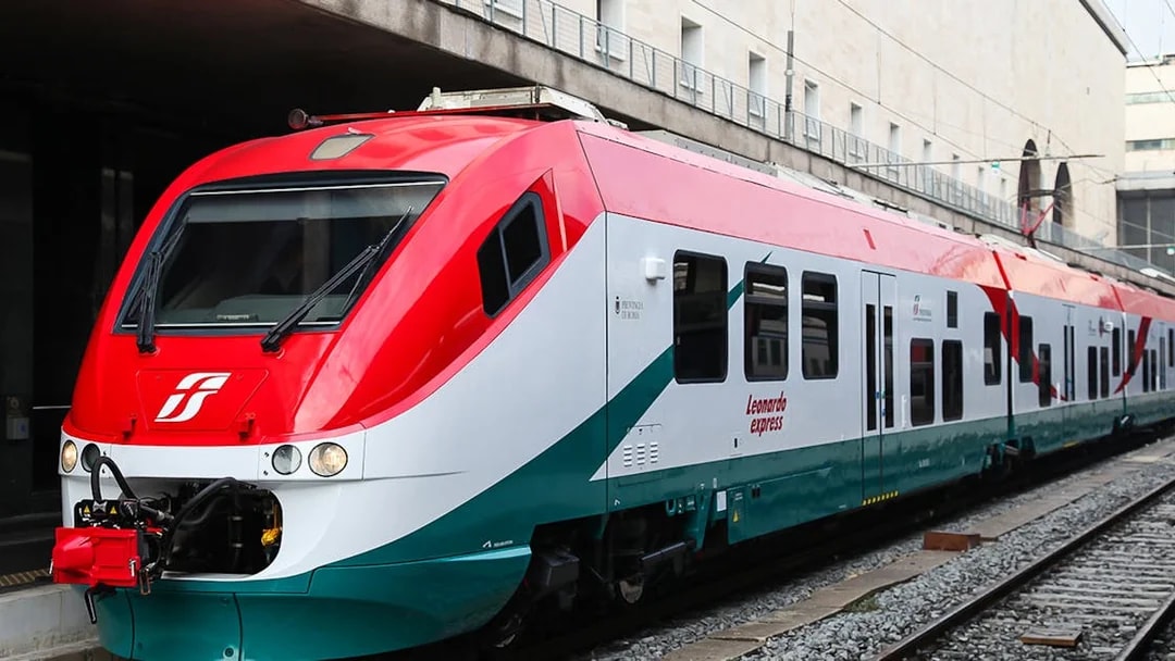 Leonardo Express train at station for Fiumicino Airport transfers, Rome, Italy.