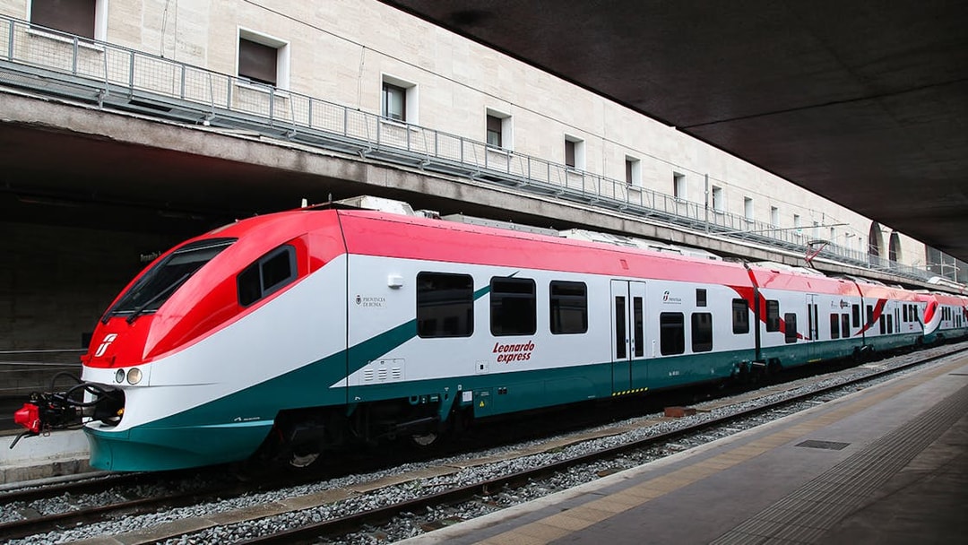Leonardo Express train at station platform for Fiumicino Airport transfers.