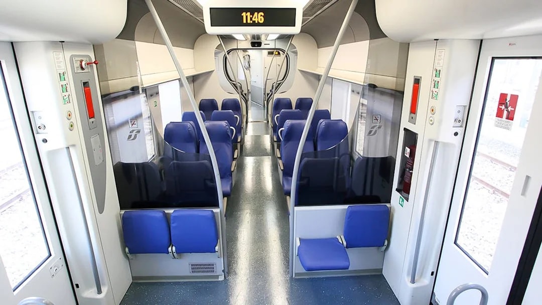Comfortable seating in Leonardo Express train carriage.