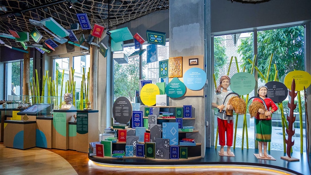 Exhibit featuring cultural artifacts and statues at Expo City Dubai.