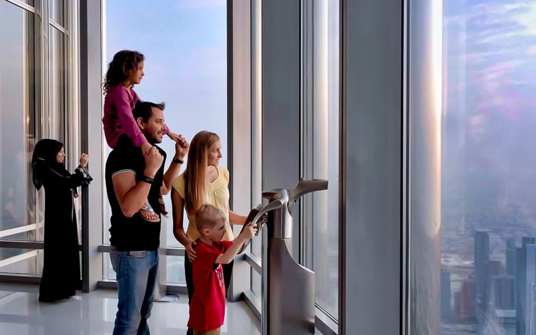 Visitors enjoying the view from Burj Khalifa's At The Top, Levels 124 and 125, Dubai.