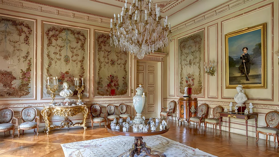 Liria Palace room with ornate ceiling, classic furnishings, and chandelier, Madrid.