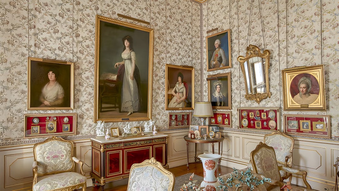 Paintings and portraits in an ornate room at Liria Palace, Madrid.