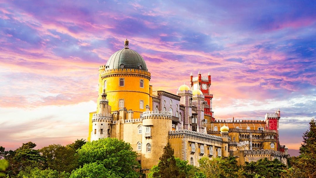 Pena Palace in Sintra at sunset, part of Lisbon day tour.