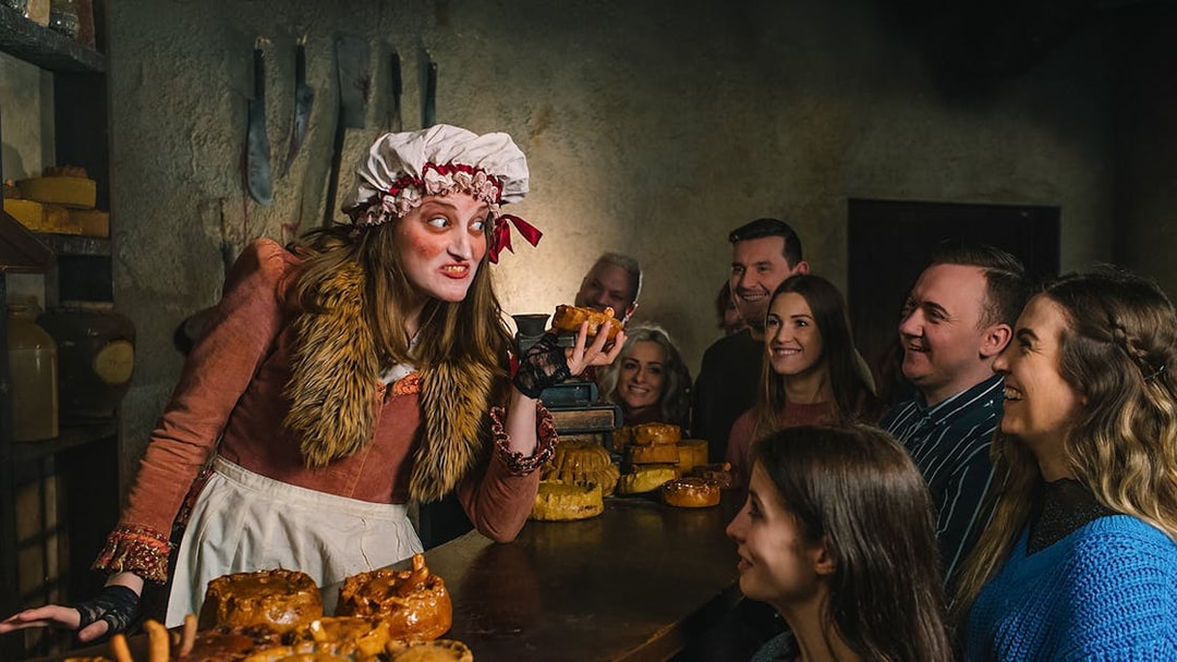 Mrs Lovett serving pies to visitors at London Dungeon's pie shop.