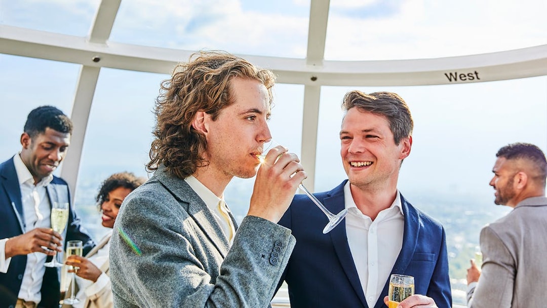 Guests enjoying champagne on the London Eye capsule.