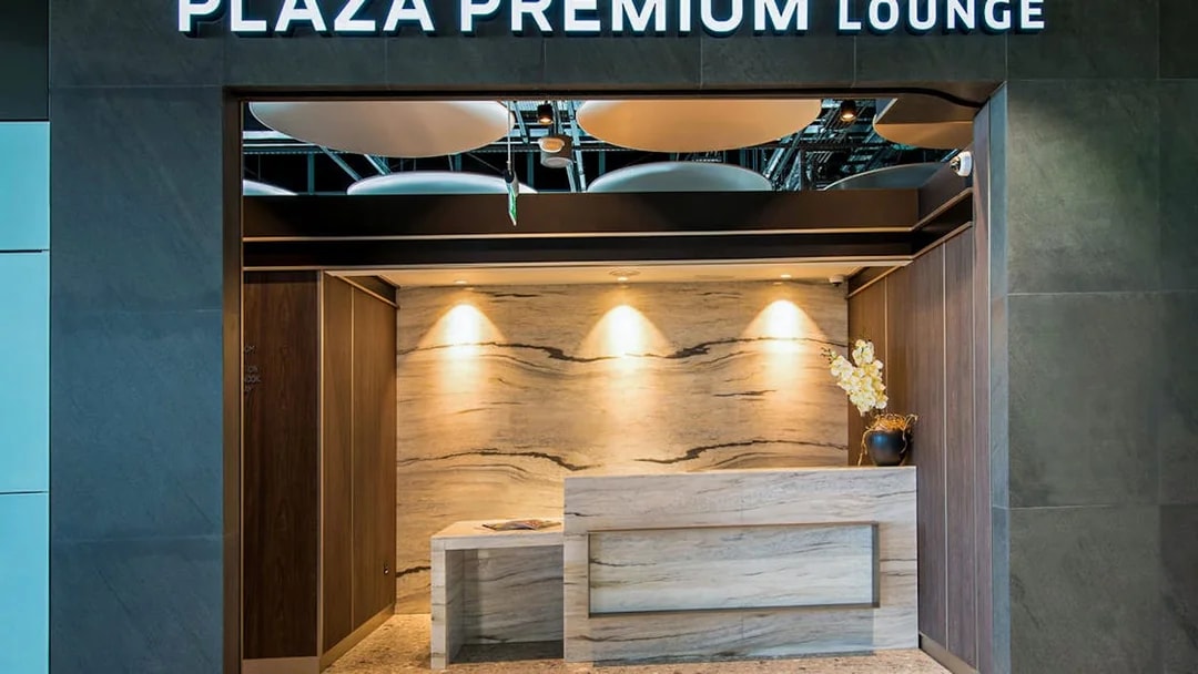 Heathrow Plaza Premium Lounge entrance with modern reception desk.