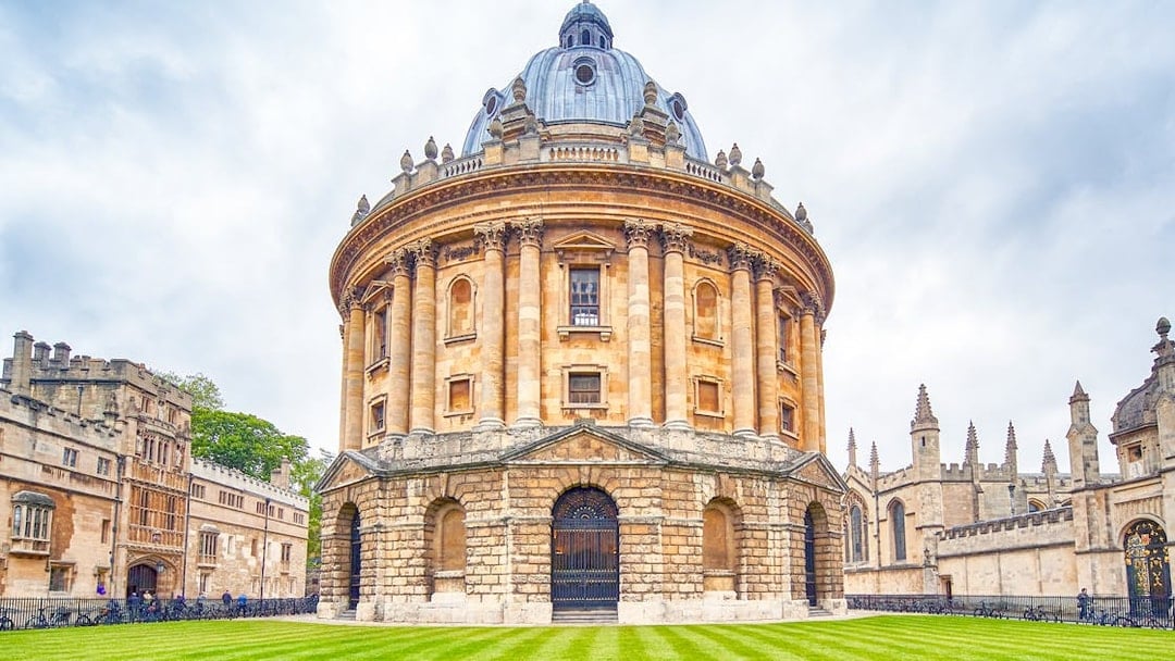 Radcliffe Camera at Oxford University, England, with surrounding historic architecture.