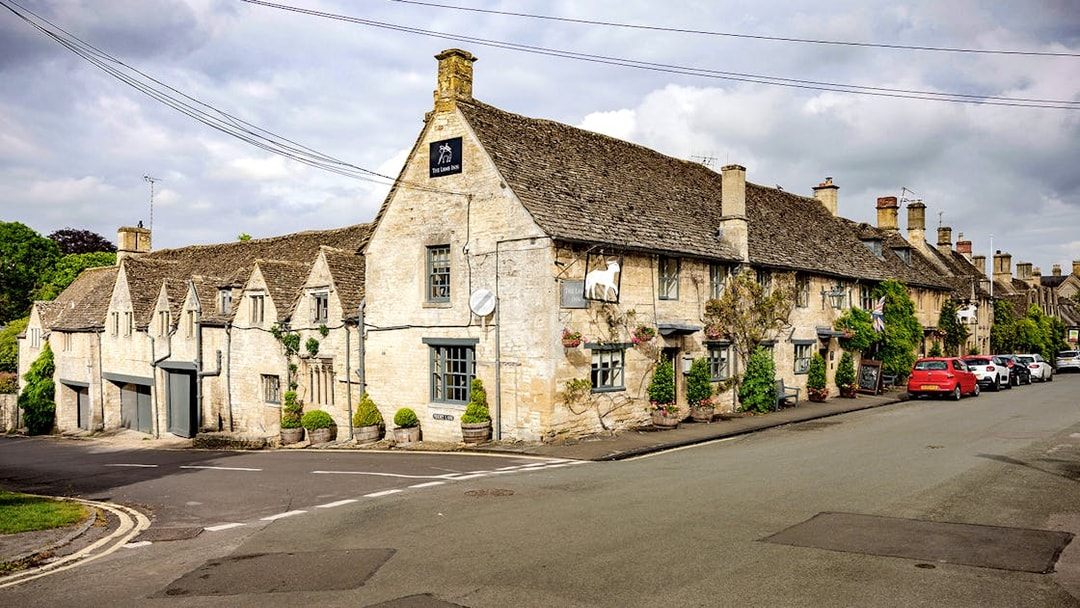 Historic stone pub in Cotswolds village, part of Oxford tour with country lunch.