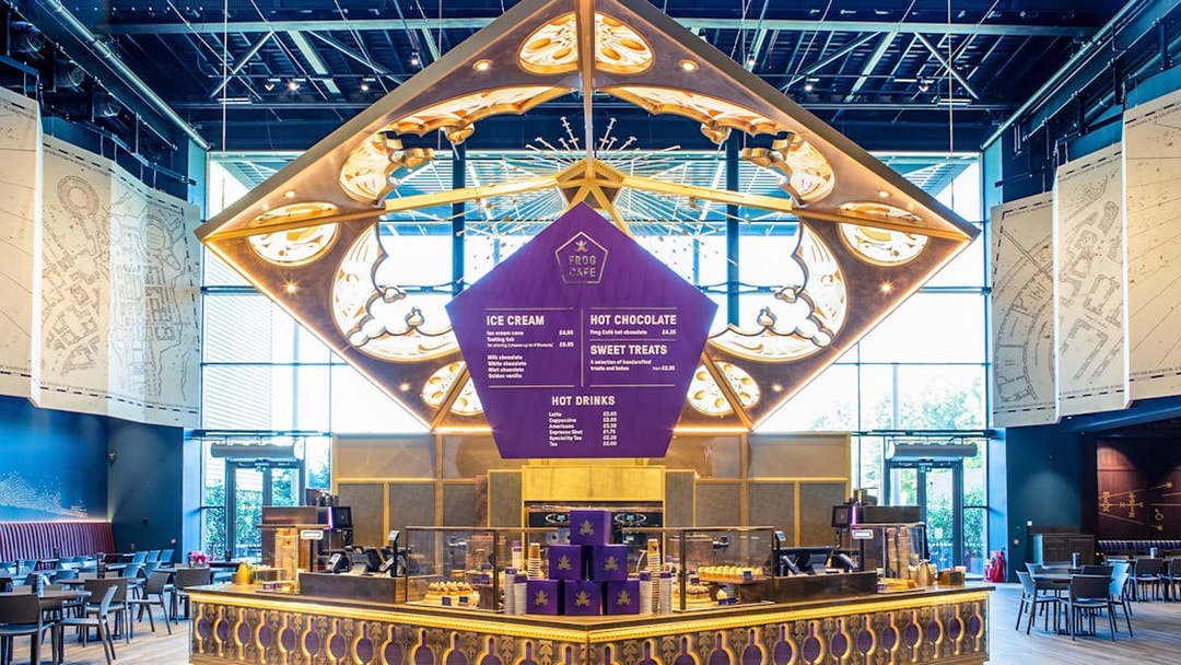 Frog Cafe interior with menu display during Harry Potter London tour.