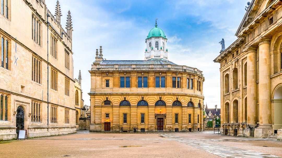 Sheldonian Theatre in Oxford with its distinctive dome and surrounding historic architecture.