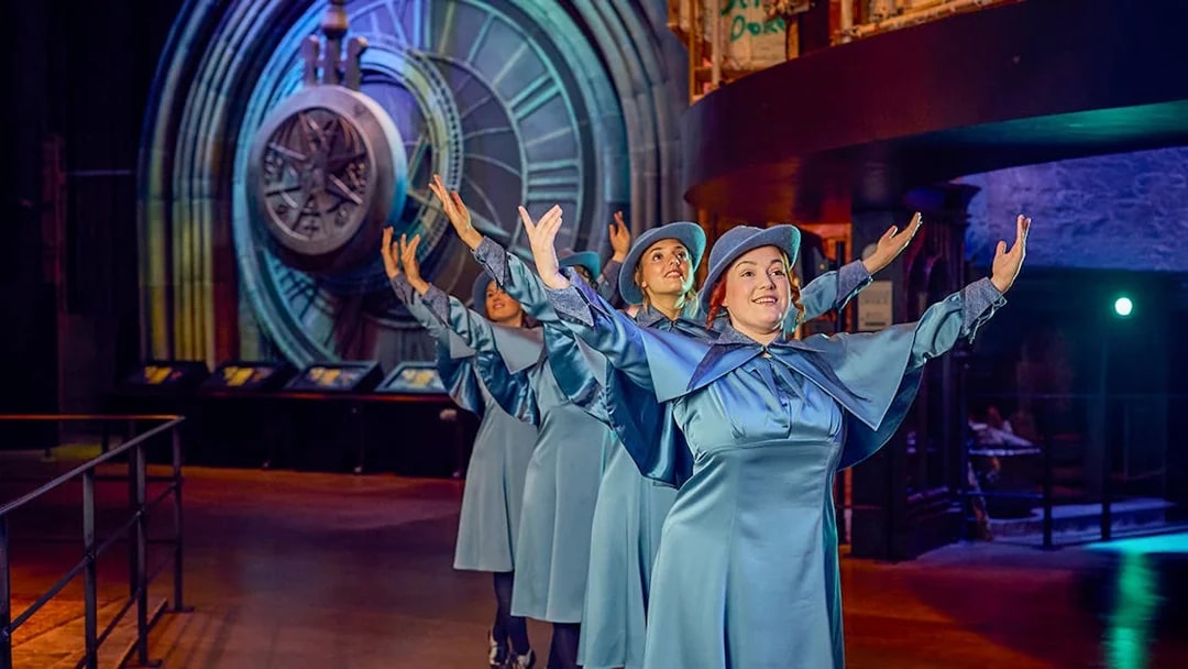 Performers in blue costumes at Triwizard Tournament, Warner Bros. Studio Tour London.
