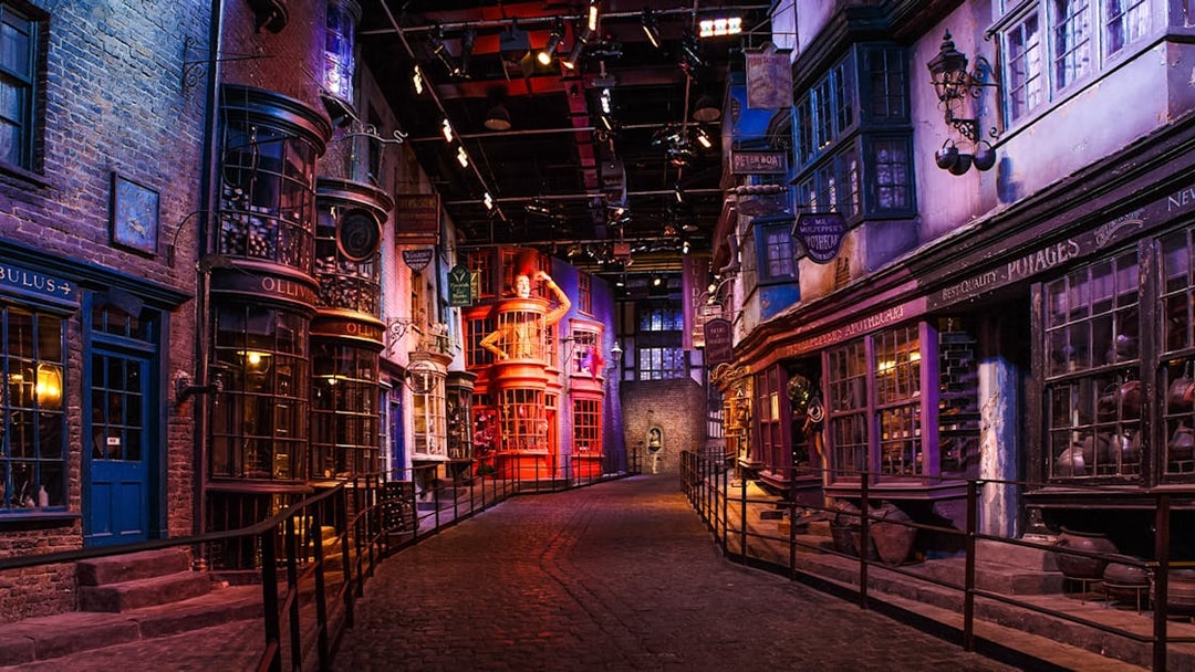 Diagon Alley set during Harry Potter London tour, featuring shopfronts and cobblestone path.