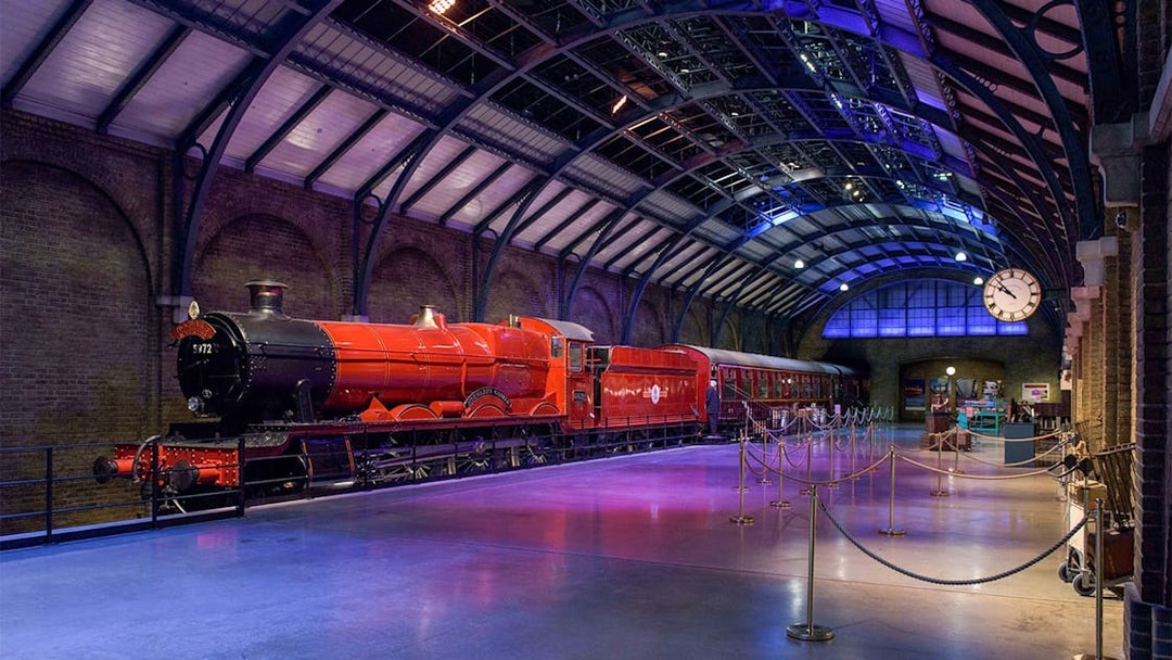 Red steam train at Platform 9 3/4, Warner Bros. Harry Potter Studio Tour.