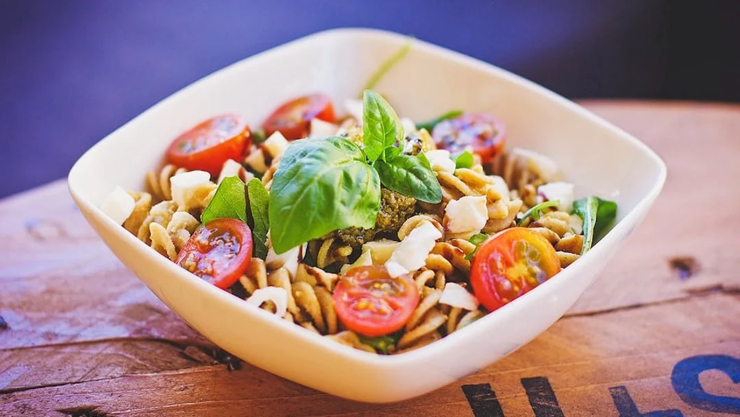 Pasta salad with cherry tomatoes and basil at Illy Cafe, overlooking Royal Gardens.