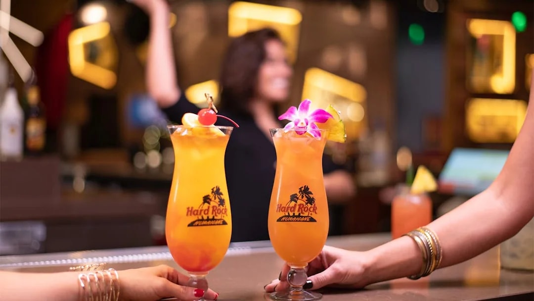 Cocktails being served at Hard Rock Cafe Milan bar.