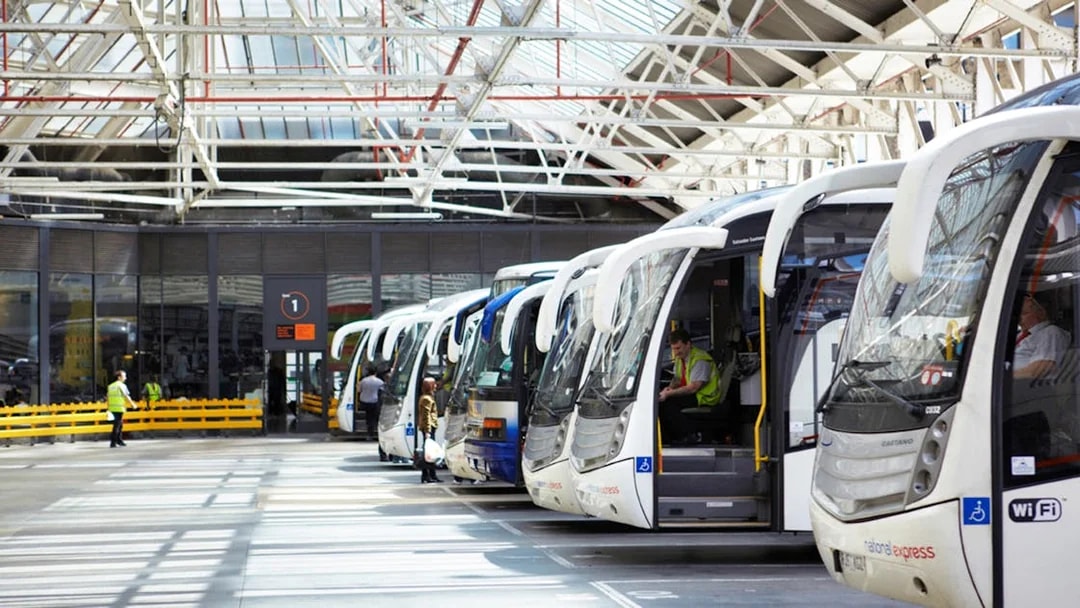 Coaches lined up at Victoria Station for Stansted Airport round-trip service.
