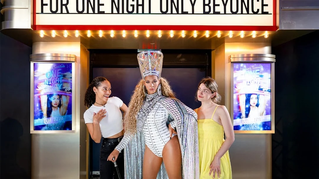 Two friends with Beyoncé's wax figure at Madame Tussauds, New York.