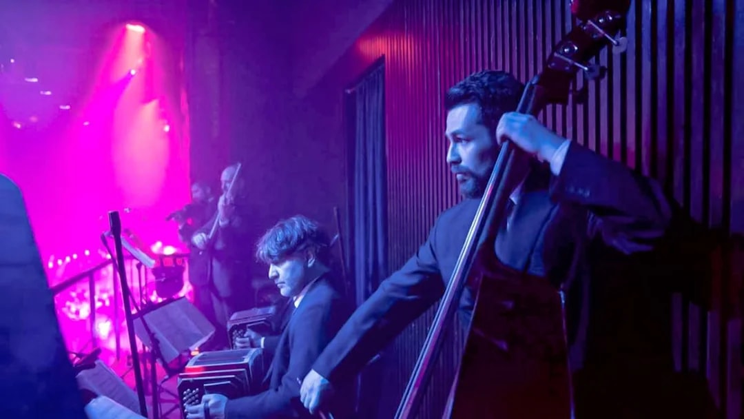 Musicians performing at Madero Tango Show in Buenos Aires.