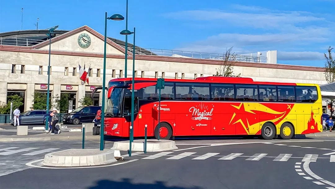 Shuttle bus at Disneyland Paris station for CDG/ORY airport transfer.