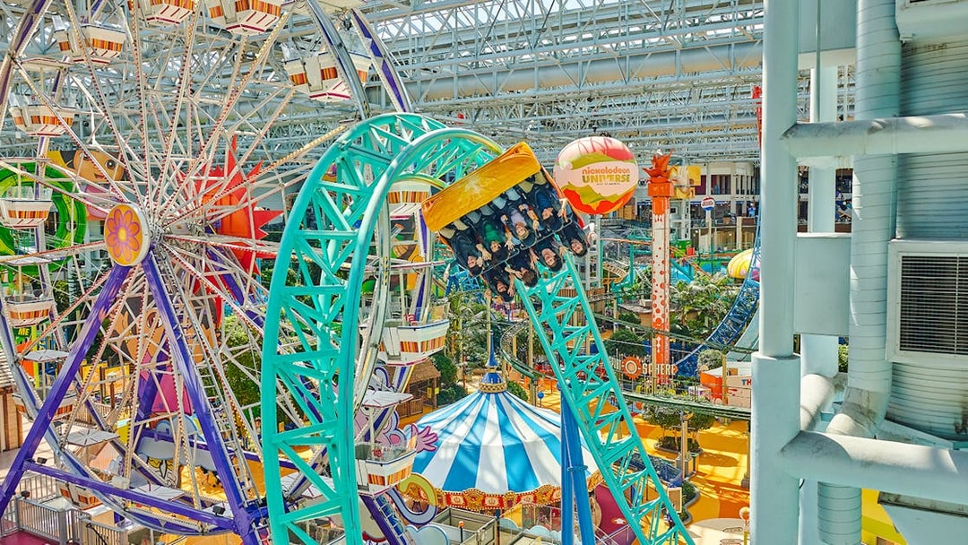 Guests on a roller coaster at Nickelodeon Universe, Mall of America.