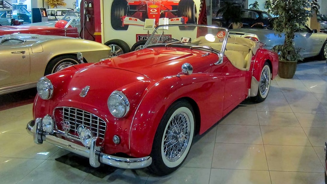 Red vintage convertible car at Malta Classic Car Collection Museum.