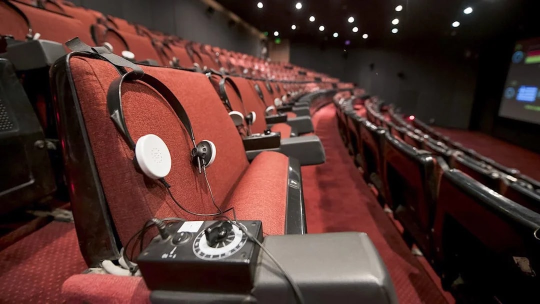 Headphones on theatre seat for The Malta Experience show.